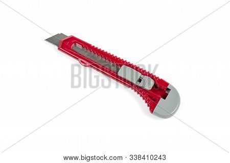 Dark Red Office Stationery Cutter Knife With Locking Device And Snap-off Blade On A White Background