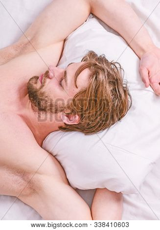 Bearded Man Sleeping Face Relaxing On Pillow. How Much Sleep You Actually Need. Man Handsome Guy Lay