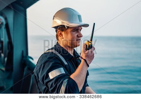 Marine Deck Officer Or Chief Mate On Deck Of Offshore Vessel Or Ship , Wearing Ppe Personal Protecti
