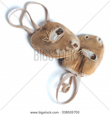 A Pair Of Special Shoes For Rhythmic Gymnastics Is Very Worn Out Due To Heavy Loads And Numerous Wor