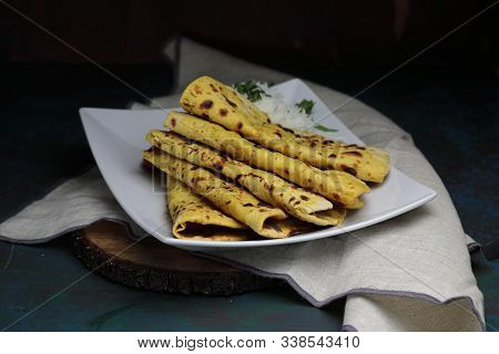 Home Made Gluten Free Chickpea Flour Roti Or Besan Roti Or Chapati Or Bread On A Plate .