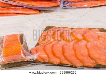 Red Fish In A Sealed Vacuum Plastic Bag. Finished Product From Production