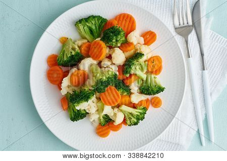 Mix Of Boiled Vegetables. Broccoli, Carrots, Cauliflower. Steamed Vegetables For Dietary Low-calorie