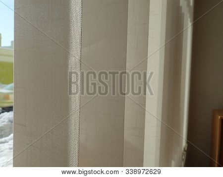 Interior Vertical Jalousie Hanged On A Window