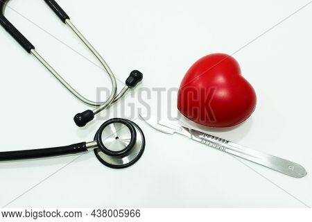 Stethoscope, Scalpel And Heart Isolated On The White Background