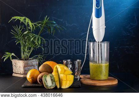 Fruit And Blender. Make Smoothies In A Blender. Chop Fruits In A Blender. Freshly Made Smoothies And