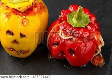 Jack O Lanterns Stuffed Yellow And Red Pepper For Halloween.
