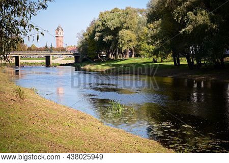 View Of The Calm Current And The Banks Of The Polist River, The Cathedral Bridge And The Old Water T