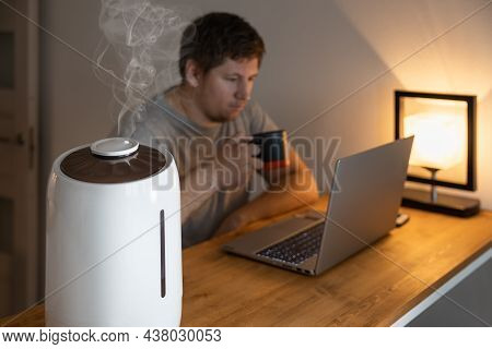 White Air Humidifier Spraying Steam. Humidification Of Dry Air. Selective Focus On Vapor. Air Purity