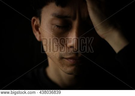 Image Of A Man Who Sheds Tears
