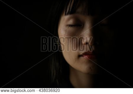 Image Of A Woman Who Sheds Tears