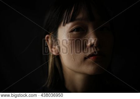 Image Of A Woman Who Sheds Tears