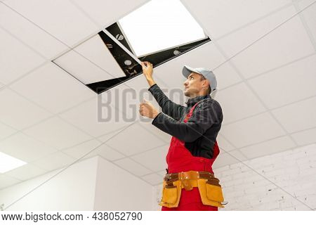 Builder Replacing Ceiling Panel, Working, Ceiling Armstrong