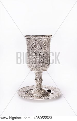 Silver Kiddush Wine Cup And Saucer Isolated On White Background.