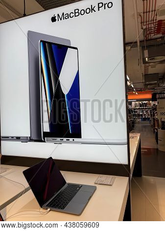 Cologne, Germany - October 01st 2021: A German Photographer Comparing And Testing The New Macbook Pr