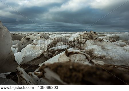 The Landscape Of The Coastal Strip Of The Baltic Sea In Early Spring, The Last Snow Background Of Th