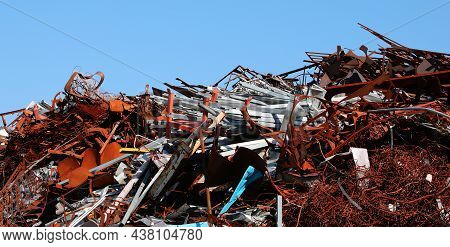 Pile Of Many Rusted Ferrous Scrap In A Landfill Controlled By A Foundry