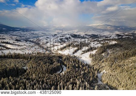 Winter Landscape With Spruse Trees Of Snow Covered Forest In Cold Mountains.