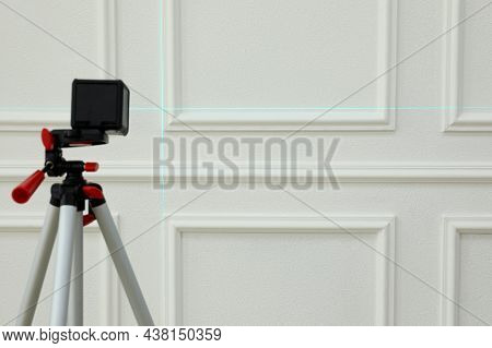 Cross Lines Of Laser Level On White Wall
