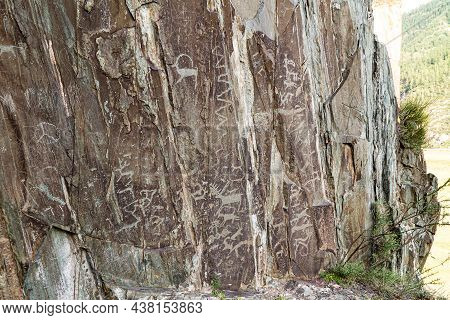 Preserved Rock Paintings- Petroglyphs In Altai Mountains Depict Wild Animals, Hunting Scenes Of Peop