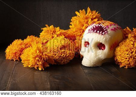 Sugar Skull With Cempasuchil Flowers Or Marigold. Decoration Traditionally Used In Altars For The Ce