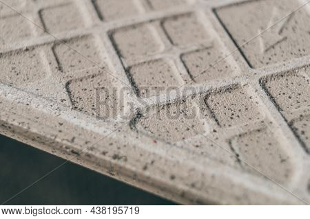 The Back Side Of The Tile Is Close-up. Texture Of The Reverse Side Of The Tile
