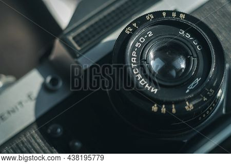 Close-up Of The Soviet Manual Lens Industar 50-2 On A Film Camera Zenit-e. Black Background, Copy Sp