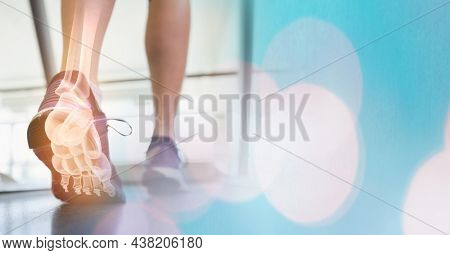 Digital composite image of leg bones of athlete running on treadmill in gym with sports shoes. fitness and healthy lifestyle concept.