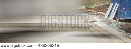 Defocused image montage of construction site with wooden planks and incomplete structures. architecture and construction industry.