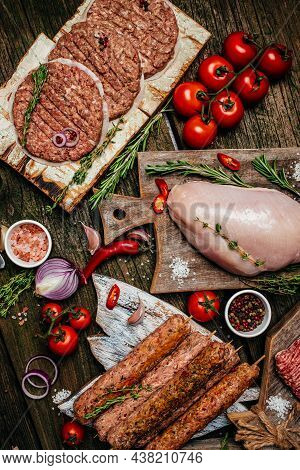 Delicious Assortment Of Raw Meat Products, Different Parts Of The Body. Minced Beef Meat Kebabs, Por