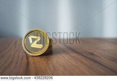 Zilliqa Coin With Stack Of Crypto Coins On Wooden Surface With Copy Space. Close-up Of Zil Cryptocur