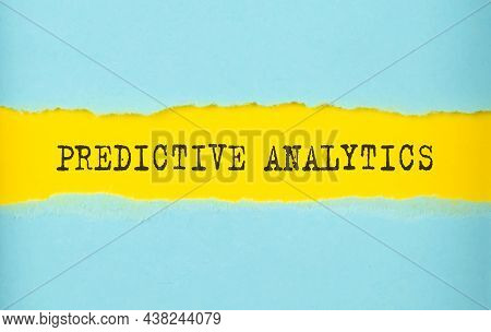 Predictive Analytics Text On Torn Paper , Yellow Background