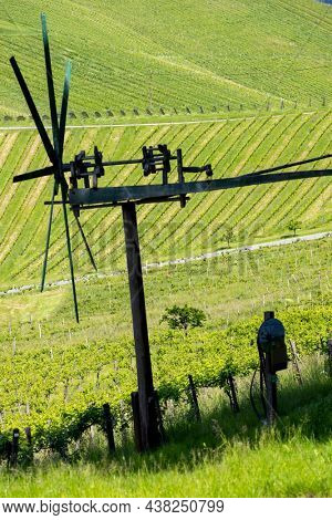 vineyard with windmill called klapotetz in south of Styria, Austria