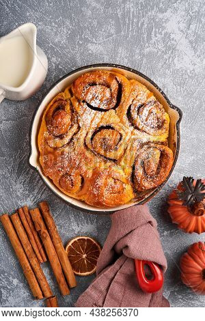 Cinnabon Cinnamon Rolls Buns With Pumpkin, Nut, Caramel And Sugar Cream Iced. Top View. Sweet Homema