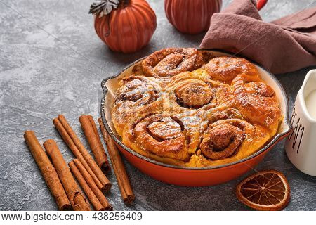 Cinnabon Cinnamon Rolls Buns With Pumpkin, Nut, Caramel And Sugar Cream Iced. Top View. Sweet Homema