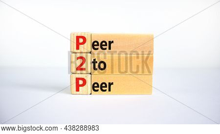 P2p, Peer To Peer Symbol. Wooden Blocks With Concept Words 'p2p, Peer To Peer'. Beautiful White Back