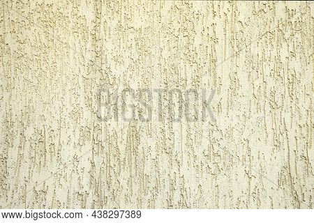 Texture Of Ivory Ribby Stucco On Cement Wall.