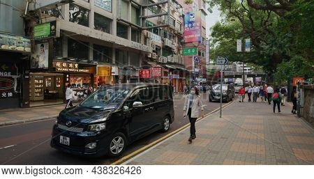 Tsim Sha Tsui, Hong Kong 17 April 2021: First personal view of people walk at the city street