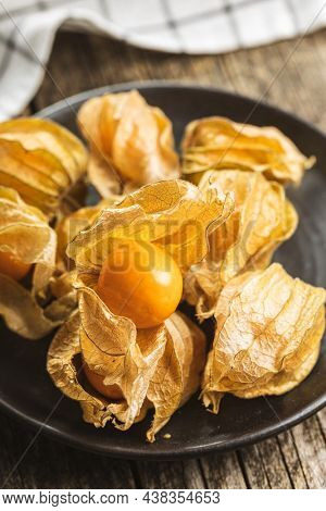 Physalis peruviana. Cape Gooseberry or ground cherries fruit on plate