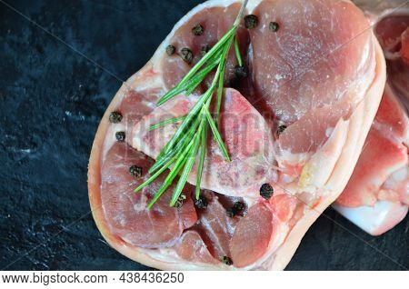 Pieces Of Raw Pork Steaks, With Ingredients For Cooking, Served On Woodenboard. Concept Of Food Prep