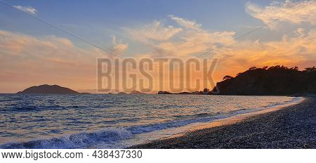Calm Mediterrian Sea Shore After The Sunset