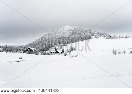 Winter In Jizera Mountains. Cloudy Evening In Jizerka Village, Czech Republic