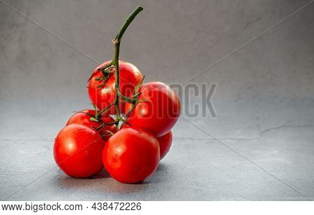 Tomato Branch, Cucumber And Yellow Pepper On Bright Background