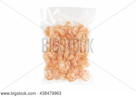 Shrimps In A Plastic Vacuum Bag Isolated On A White Background. Vacuum Packaged Food.