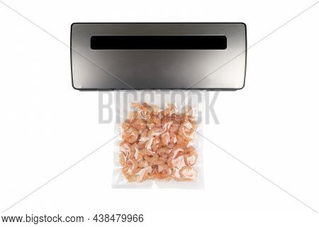 Vacuum Packer Machine With Shrimps In A Plastic Bag Isolated On A White Background.