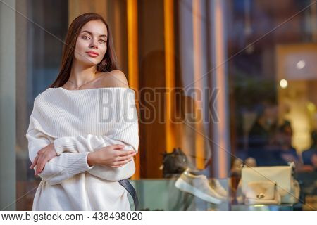 Beautiful Sexy Woman Wearing Fashionable Spring Or Fall Clothes  - White Warm Fluffy Sweater Dress. 