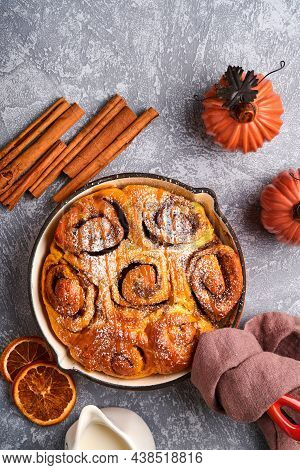 Cinnabon Cinnamon Rolls Buns With Pumpkin, Nut, Caramel And Sugar Cream Iced. Top View. Sweet Homema