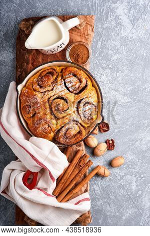 Cinnabon Cinnamon Rolls Buns With Pumpkin, Nut, Caramel And Sugar Cream Iced. Top View. Sweet Homema