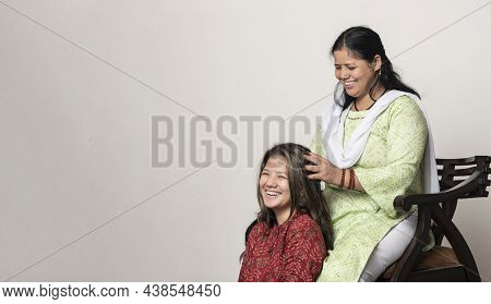 An Indian Girl Getting Her Head Massage By Her Mother, Daughter And Mother Love For Mother's Day Con