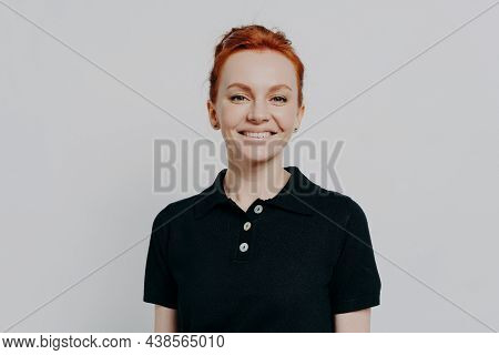 Young Happy Gorgeous Redhead Woman Smiling At Camera While Posing Isolated Over Grey Background, Pos